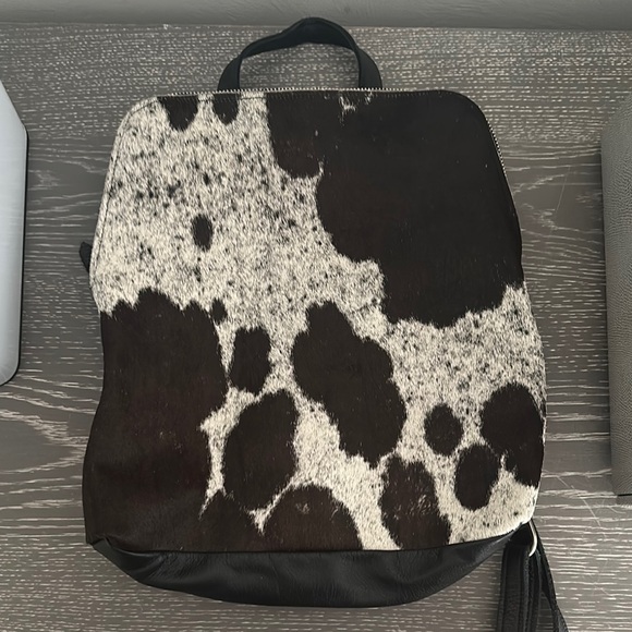 Black and White Cowhide Backpack - Picture 1 of 5